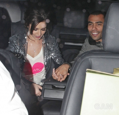 Nicola_and_Cheryl_leaving_XFactor_Studios_131209_14.jpg