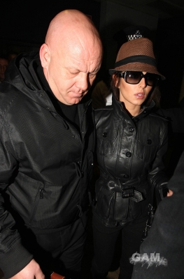 Cheryl_Cole_arrives_at_Heathrow_airport_in_London_23_02_10_13.jpg