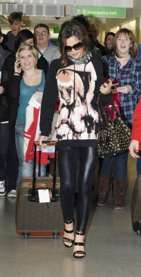 Cheryl_Cole_arriving_at_Heathrow_London_17_02_10_20.jpg