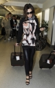 Cheryl_Cole_arriving_at_Heathrow_London_17_02_10_11.jpg