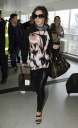 Cheryl_Cole_arriving_at_Heathrow_London_17_02_10_12.jpg