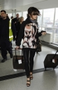 Cheryl_Cole_arriving_at_Heathrow_London_17_02_10_13.jpg