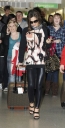 Cheryl_Cole_arriving_at_Heathrow_London_17_02_10_20.jpg