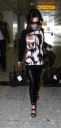 Cheryl_Cole_arriving_at_Heathrow_London_17_02_10_23.jpg