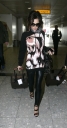 Cheryl_Cole_arriving_at_Heathrow_London_17_02_10_27.jpg