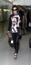 Cheryl_Cole_arriving_at_Heathrow_London_17_02_10_29.jpg