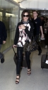Cheryl_Cole_arriving_at_Heathrow_London_17_02_10_30.jpg