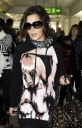 Cheryl_Cole_arriving_at_Heathrow_London_17_02_10_6.jpg