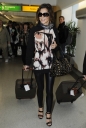 Cheryl_Cole_arriving_at_Heathrow_London_17_02_10_9.jpg