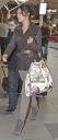 Cheryl_Cole_arrives_at_Heathrow_Airport_23_02_11_26.jpg