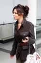 Cheryl_Cole_arrives_at_Heathrow_Airport_23_02_11_7.jpg