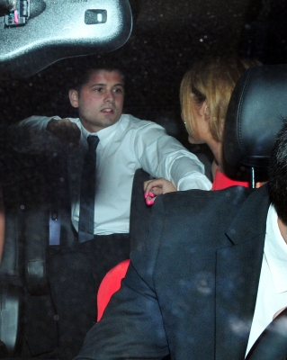 Cheryl_and_Kim_arriving_back_at_The_Loews_Hotel_10_07_11_1.jpg