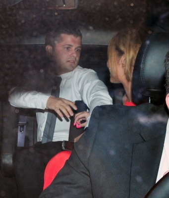 Cheryl_and_Kim_arriving_back_at_The_Loews_Hotel_10_07_11_3.jpg
