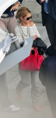 Cheryl_Cole_arriving_at_Heathrow_Airport_01_09_11_1.jpg