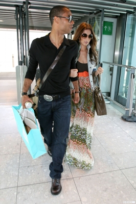 Cheryl__Ashley_spotted_at_an_airport_to_depart_on_holiday_-11_06_09_15.jpg