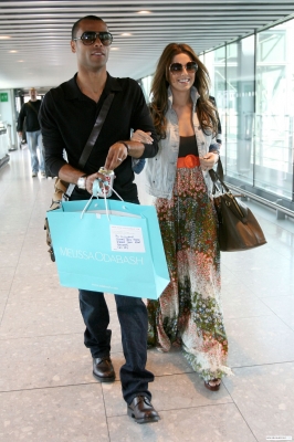 Cheryl__Ashley_spotted_at_an_airport_to_depart_on_holiday_-11_06_09_22.jpg