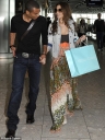 Cheryl__Ashley_spotted_at_an_airport_to_depart_on_holiday_-11_06_09_1.jpg