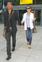 Cheryl_and_Ashley_arriving_at_Heathrow_airport_19_06_09_11.jpg