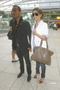 Cheryl_and_Ashley_arriving_at_Heathrow_airport_19_06_09_20.jpg