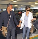 Cheryl_and_Ashley_arriving_at_Heathrow_airport_19_06_09_5.jpg