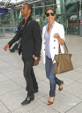Cheryl_and_Ashley_arriving_at_Heathrow_airport_19_06_09_7.jpg