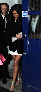 Cheryl_and_Ashley_leave_The_Brits_After_Party_in_Claridges_190209_26.jpg