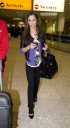 Cheryl_Cole_arriving_at_Heathrow_airport_10022009_1.jpg