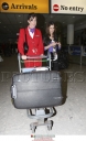 Cheryl_Cole_arriving_at_Heathrow_airport_10022009_37.jpg
