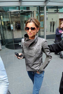 Cheryl_and_Ashley_leaving_the_Radisson_Hotel_seperately_010708_19.jpg