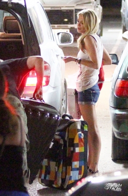 Sarah_Harding_arriving_at_the_airport_in_Ibiza_01_07_12_28229.jpg