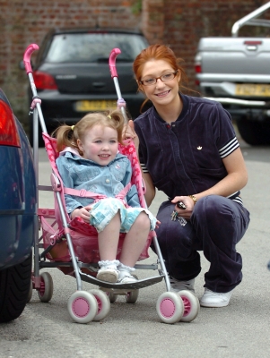 Nicola_Out__About_With_Her_Mother__Sister_150406_7.jpg