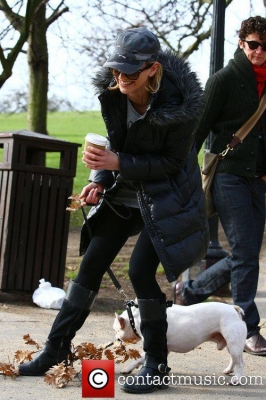 Sarah_Harding_walking_her_dog_Claude_in_North_London__It_was_Claude_s_first_walk_in_a_week_after_he_suffered_a_slipped_disc__London2C_England_20_02_12_28929.jpg