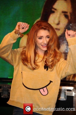 Nicola_signs_copies_of_Cinderella_s_Eyes_in_London_26_09_11_284029.jpg