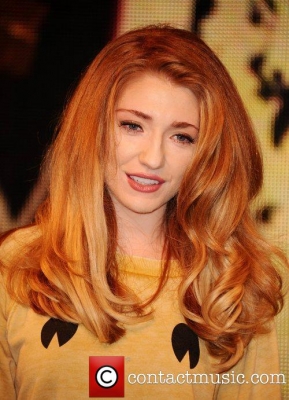 Nicola_signs_copies_of_Cinderella_s_Eyes_in_London_26_09_11_284329.jpg