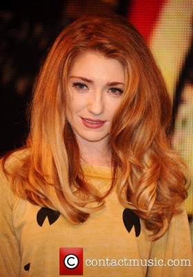 Nicola_signs_copies_of_Cinderella_s_Eyes_in_London_26_09_11_284629.jpg