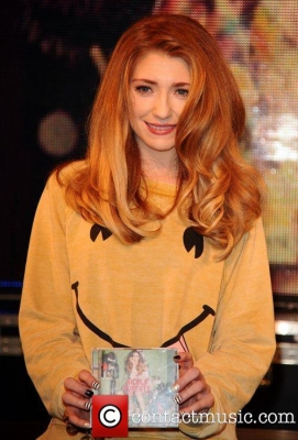Nicola_signs_copies_of_Cinderella_s_Eyes_in_London_26_09_11_284829.jpg