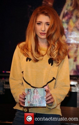 Nicola_signs_copies_of_Cinderella_s_Eyes_in_London_26_09_11_284929.jpg