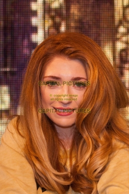 Nicola_signs_copies_of_Cinderella_s_Eyes_in_London_26_09_11_285329.jpg