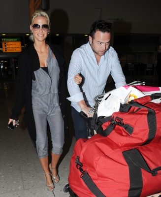 Sarah_Harding_and_Tom_Crane_arriving_back_to_UK_11_01_11_282329.jpg