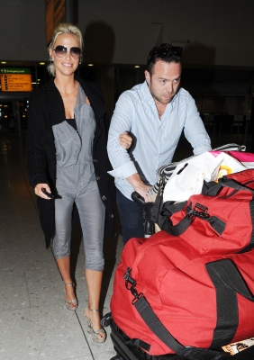 Sarah_Harding_and_Tom_Crane_arriving_back_to_UK_11_01_11_282429.jpg