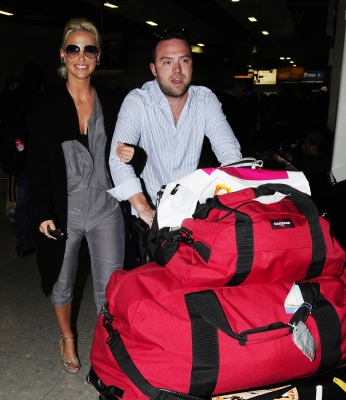 Sarah_Harding_and_Tom_Crane_arriving_back_to_UK_11_01_11_28429.jpg