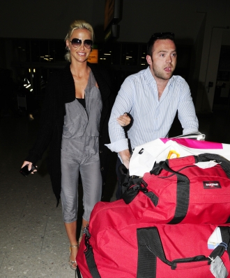 Sarah_Harding_and_Tom_Crane_arriving_back_to_UK_11_01_11_28929.jpg