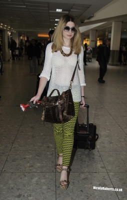 Nicola_Roberts_arrives_at_Heathrow_Airport_20_03_12_28229.jpg