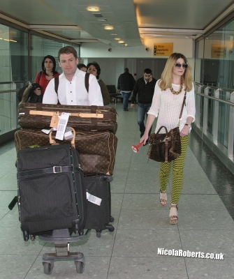 Nicola_Roberts_arrives_at_Heathrow_Airport_20_03_12_28929.jpg