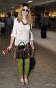 Nicola_Roberts_arrives_at_Heathrow_Airport_20_03_12_281129.jpg