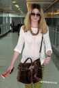 Nicola_Roberts_arrives_at_Heathrow_Airport_20_03_12_281229.jpg