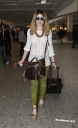 Nicola_Roberts_arrives_at_Heathrow_Airport_20_03_12_28329.jpg