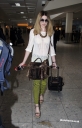 Nicola_Roberts_arrives_at_Heathrow_Airport_20_03_12_28529.jpg