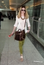 Nicola_Roberts_arrives_at_Heathrow_Airport_20_03_12_28629.jpg