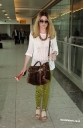 Nicola_Roberts_arrives_at_Heathrow_Airport_20_03_12_28729.jpg